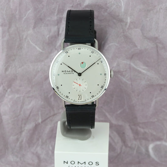 Nomos Metro Date Power Reserve 1101 - V. Gasser 1873